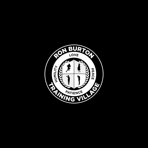 White, circular logo on navy black background with the text "Ron Burton Training Village", "Love Peace, Patience, Humility" and 4 figures, a person saluting, and a person with their head bowed and hands together in prayer.